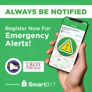 Smart911 Graphic "Always be Notified". Picture of a phone with a Will County and Troy Township logo. 